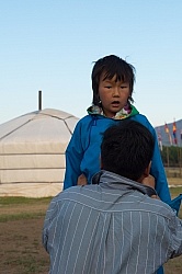 Baagii ties the Sash on his grandaighter Buggins Deel