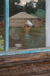 Through the Window One of Our Guides Sipping Milk Inside the Pri