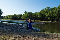 Shawn stretching by the river