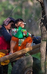 Bugiin blows bubbles