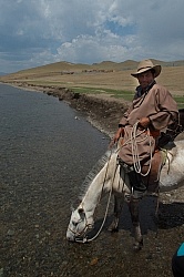 Baagii lets his horse have a drink