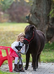 Girl with Miniature Horse