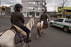 Riding through the Town of Aloag on the way to Bomboli, Ecuador