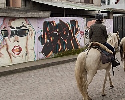 Riding through the Town of Aloag on the way to Bomboli, Ecuador