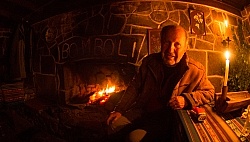 Oswaldo at the Fireplace In the Home of Oswaldo and Maria in Bom