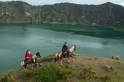 Gabriel and Rodrigo riding around  Crater Lake at Quilotoa volca