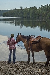 A Horse Country Campground Camper with Her Horse at Voyageur Bay