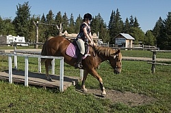Rider at Horse Country Campground Playing in the Obstacle Course