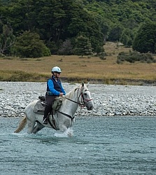 Heather and Cloud on A River Crossing on the Day Ride From Boundary Hut, Wild Womens Expeditions with Adventure Horse Trekking New Zealand