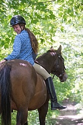 Young Girl Trail Riding Bareback