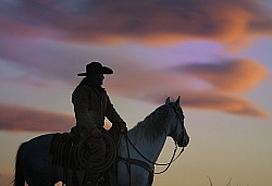 Cowgirl at Sunset