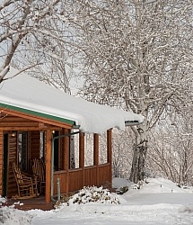 A Cabin in the Winter at The Hideout Guest Ranch