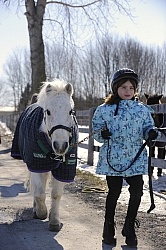 Child Leading Pony