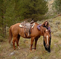 Shawn with her Horse Hobbled at Blue Sky Sage Horse Adventures