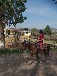 Riding past Schools and Street Markets