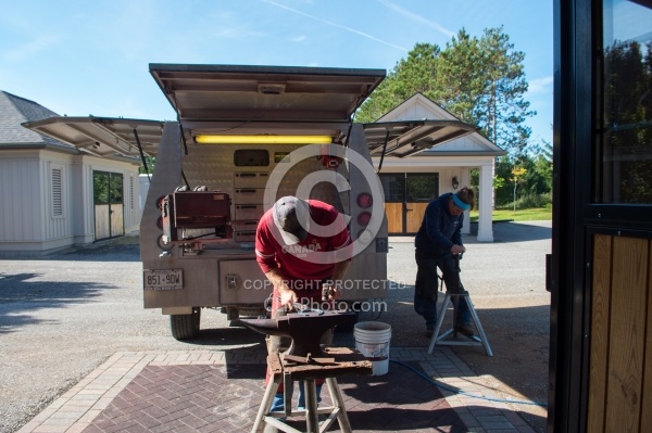 Farrier and Assistant