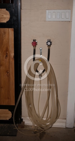 Barn Safety keeping aisles tidy Barn Hose Neatly Hanging