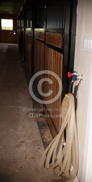 Barn Safety keeping aisles tidy Barn Hose Neatly Hanging