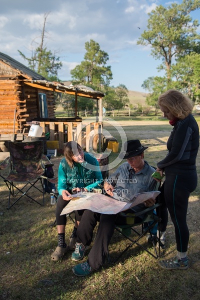 Julie Veloo points out our wherabouts on a map