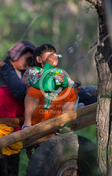 Bugiin blows bubbles