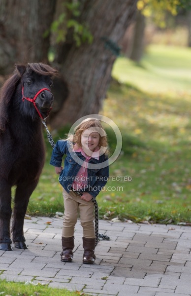 Girl with Miniature Horse