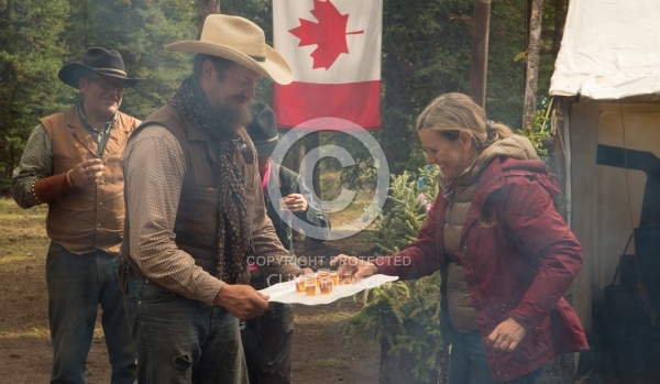 Heather takes warming shot from Chuck