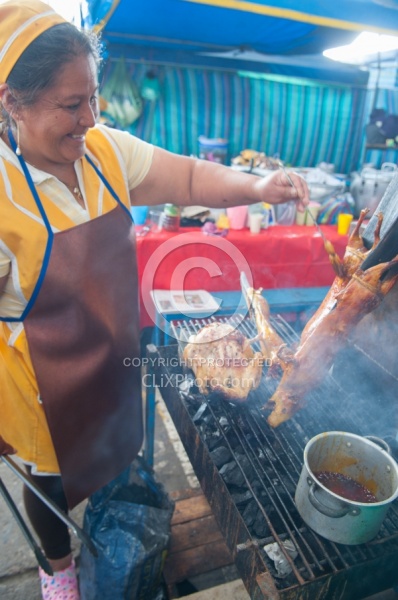 Guinea Pig on a Stick at the Local Market in Aloag, Ecuador