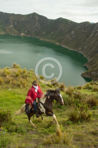 Rodrigo riding at  Crater Lake at Quilotoa volcano