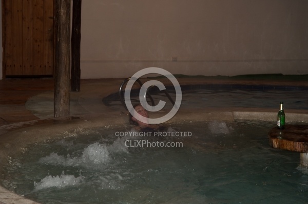 Ali enjoys the hot tub at Hosteria San Jose in Sigchos, Ecuador