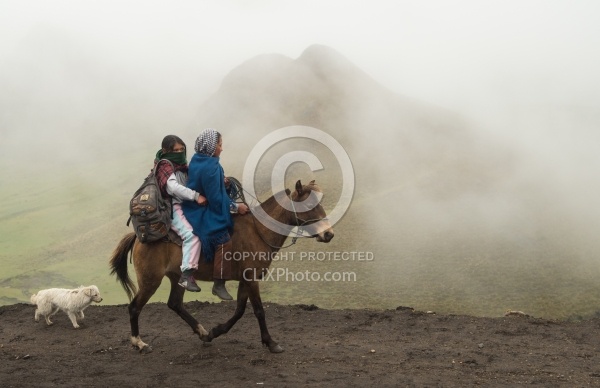 Ecuadorian girls join us on the trail in the high Andes