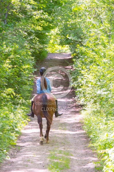 Young Girl Trail Riding Bareback
