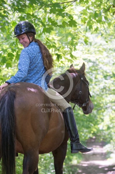 Young Girl Trail Riding Bareback