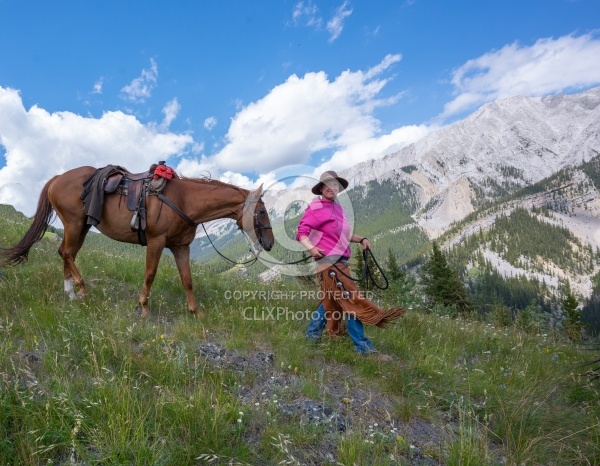 Leading Horses Downhill on the Lost Trail Ride with Anchor D