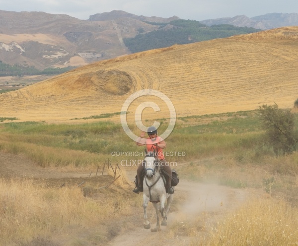 Cantering on the Coast to Coast Ride in Sicily