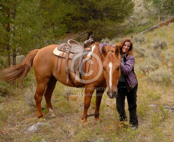 Shawn with her Horse Hobbled at Blue Sky Sage Horse Adventures