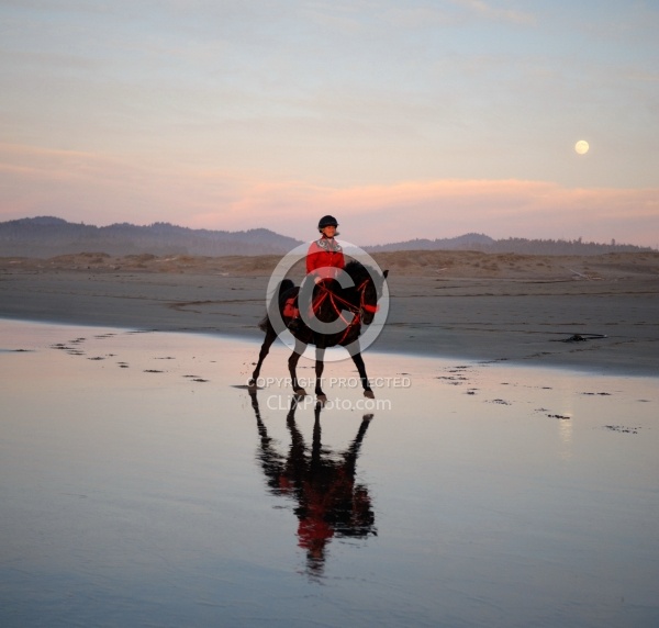 Riding on the beach at Sunset at Ricochet Ridge Ranch