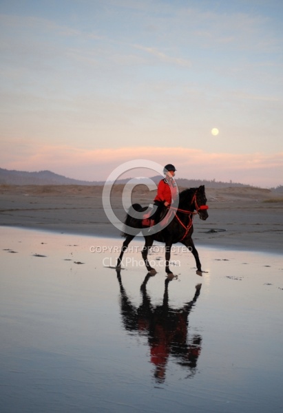 Riding on the beach at Sunset at Ricochet Ridge Ranch