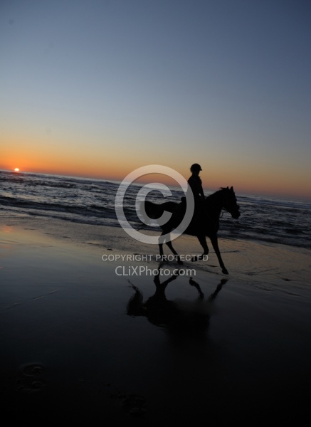 Riding on the beach at Sunset at Ricochet Ridge Ranch