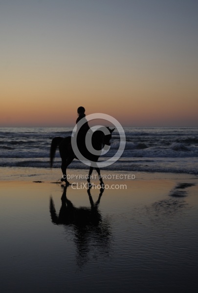 Riding on the beach at Sunset at Ricochet Ridge Ranch