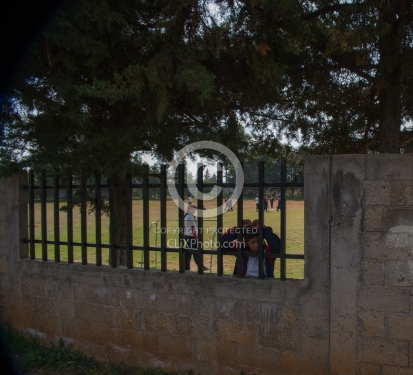 Riding past Schools and Street Markets