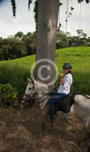 Ali eating Cantaloupe on the Trail