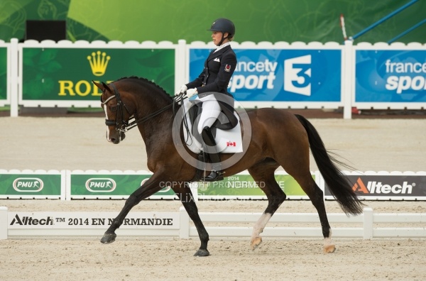 Megan Lane and Caravella in the Team Grand Prix WEG 2014 Normand